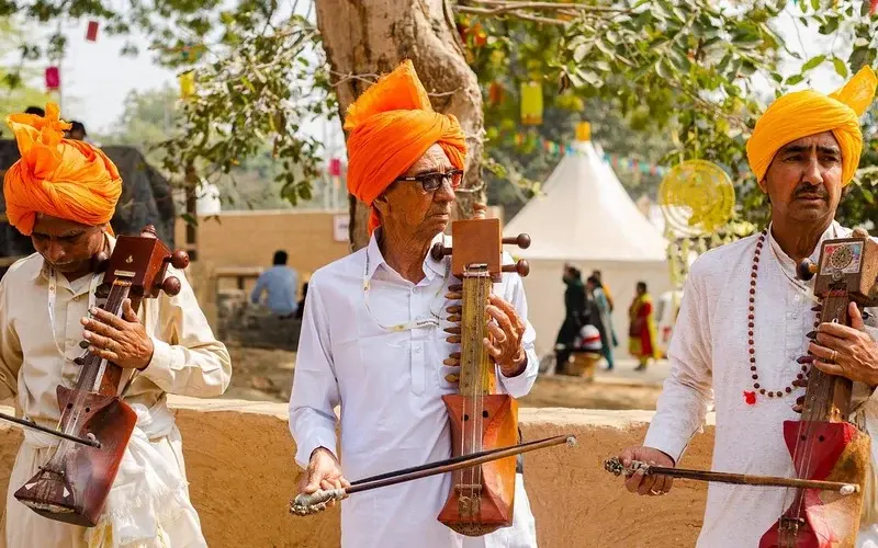 Green fields, historical monuments, and scenic gardens of Haryana under clear skies.