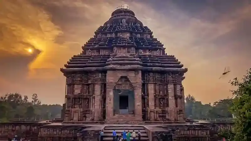 Konark Sun Temple and Odisha’s scenic coastal landscape under clear skies.