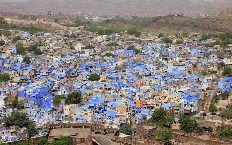 Desert landscape and historic forts of Rajasthan under a clear sky.